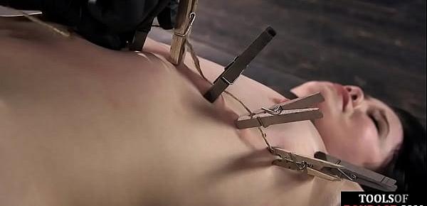  gagged slave clamped before hot wax domination